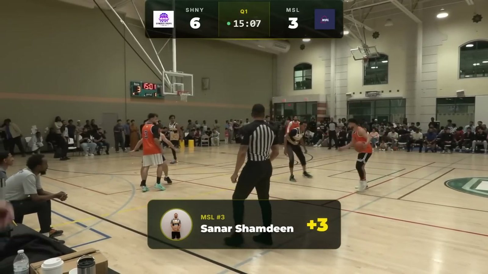 Live broadcast with scorebug overlay and player highlight card showing MSL #3 Sanar Shamdeen +3