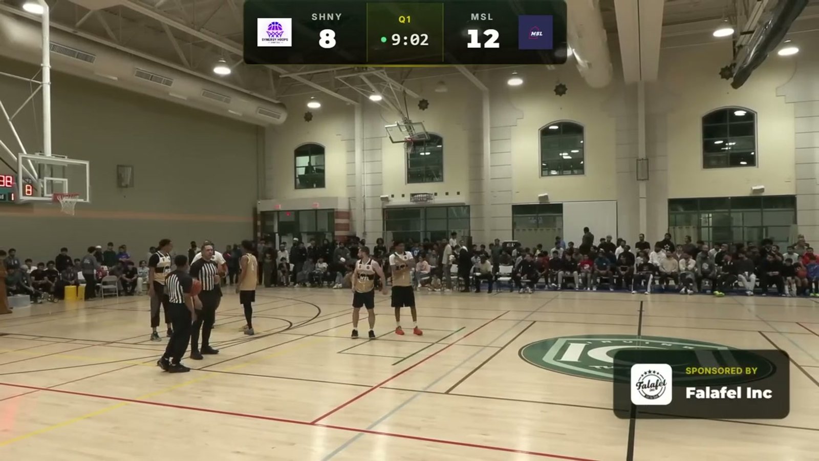 Live broadcast with a 'SPONSORED BY Falafel Inc' pop-up overlay during a stoppage